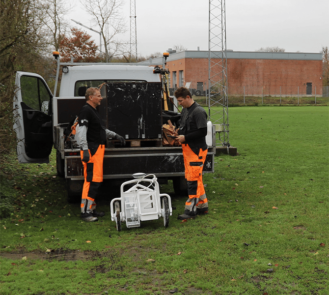 Municipal workers unloading a Pro X